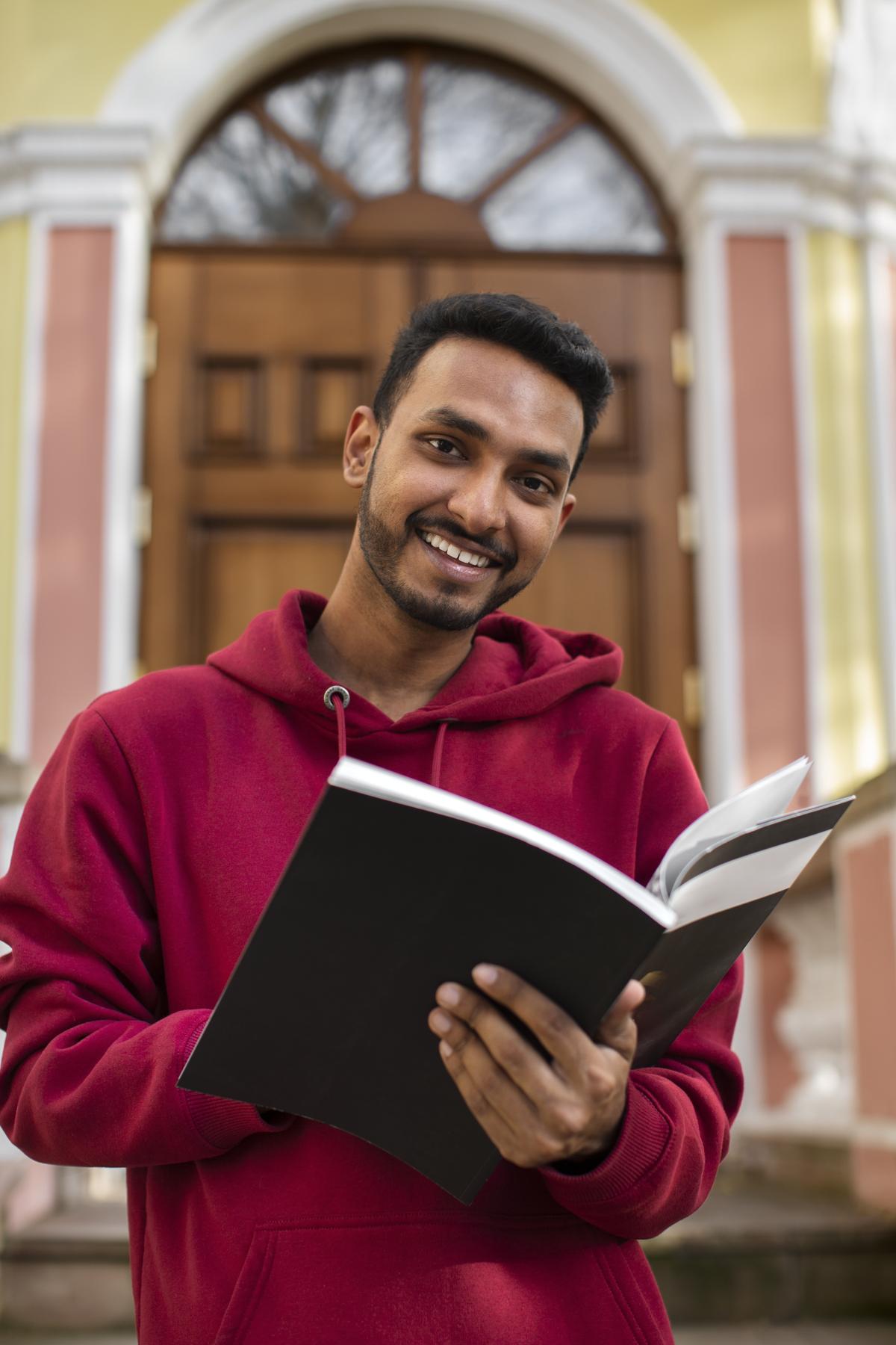 Student studying with a book